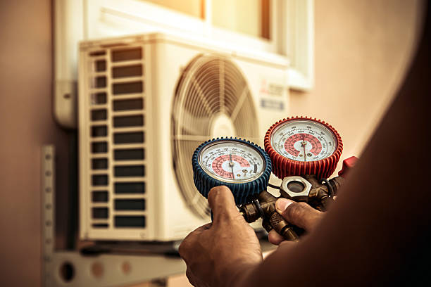 Professional Air Conditioning Service technician working in Pocono Lake, PA